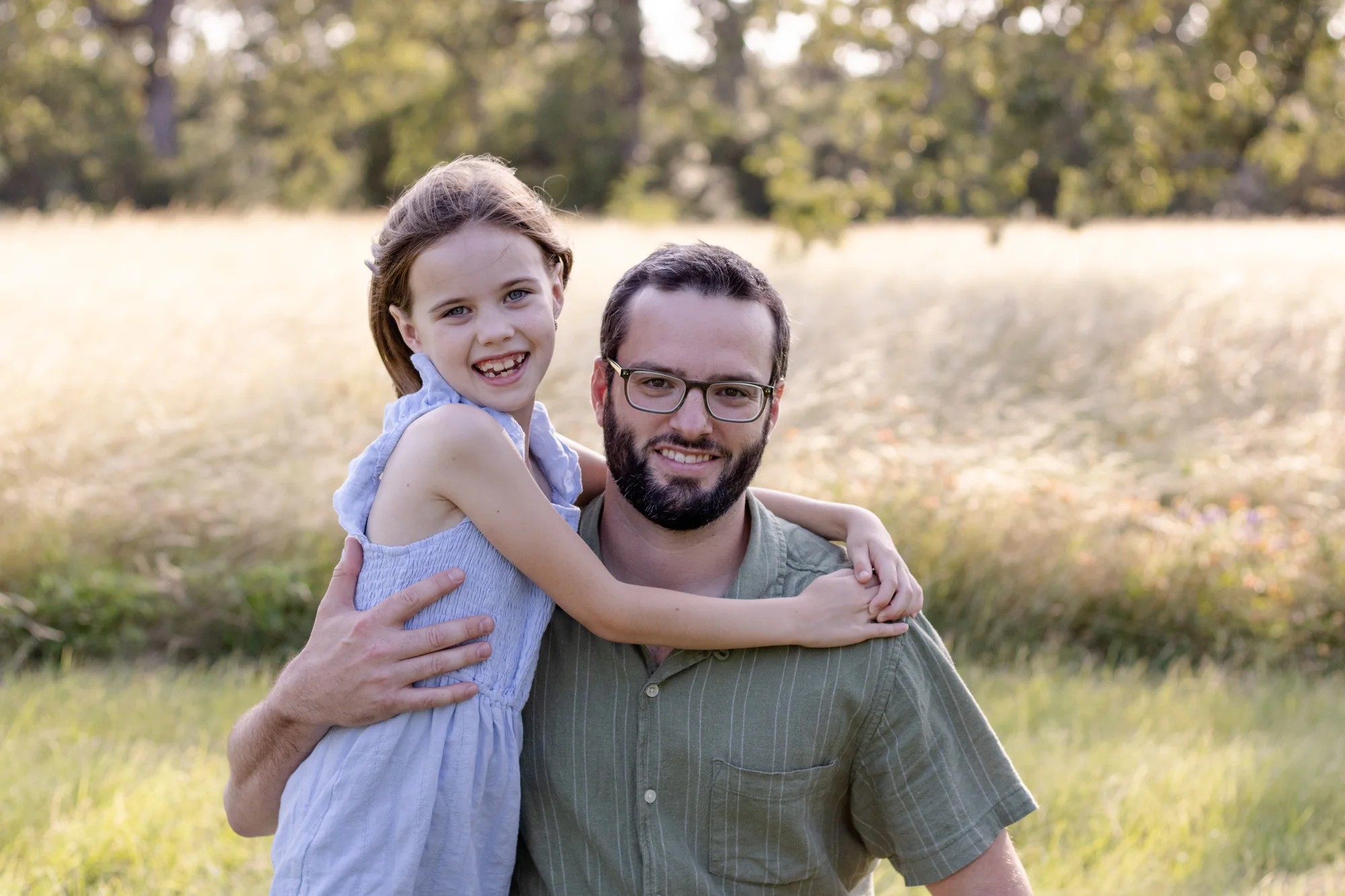 The Elsass family together outdoors