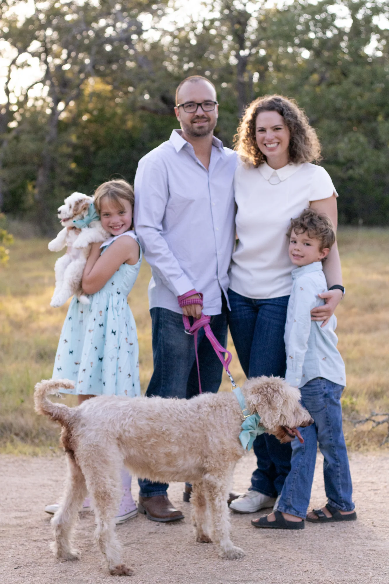 A family portrait with the Rosa family's new puppy