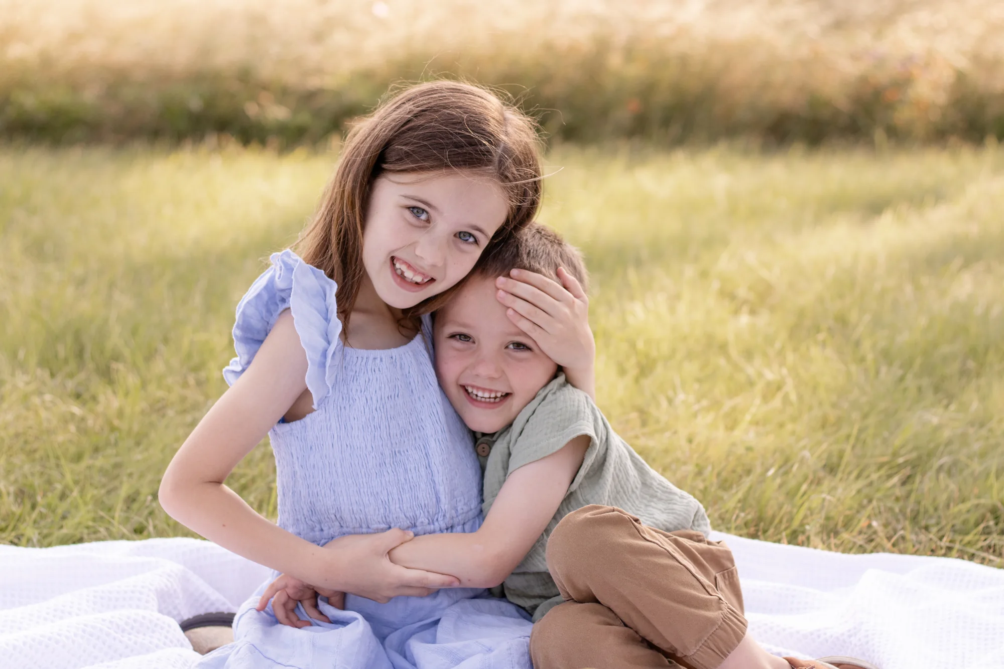 The Elsass children sharing a moment together