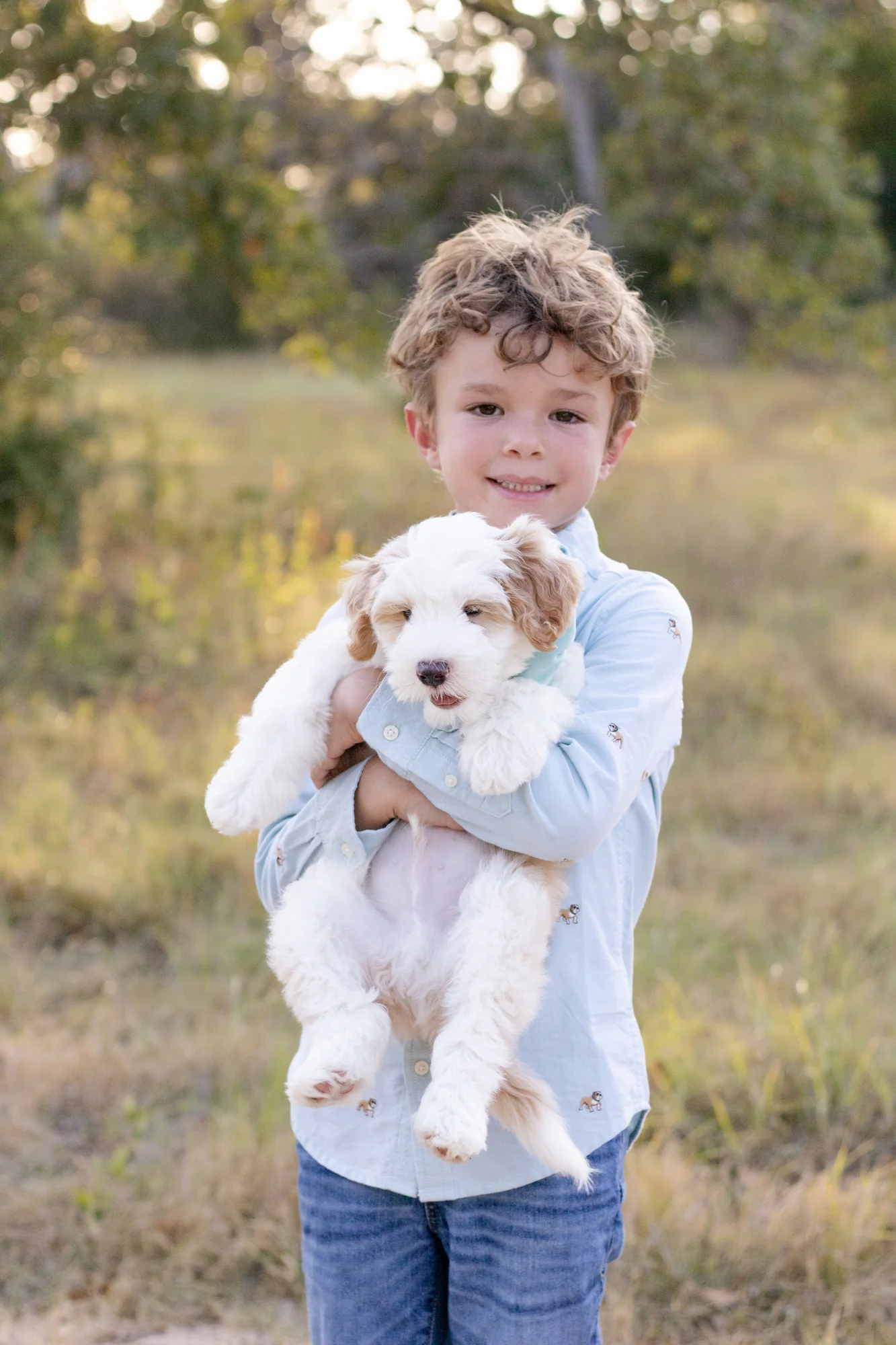 A child with the Rosa family's new puppy