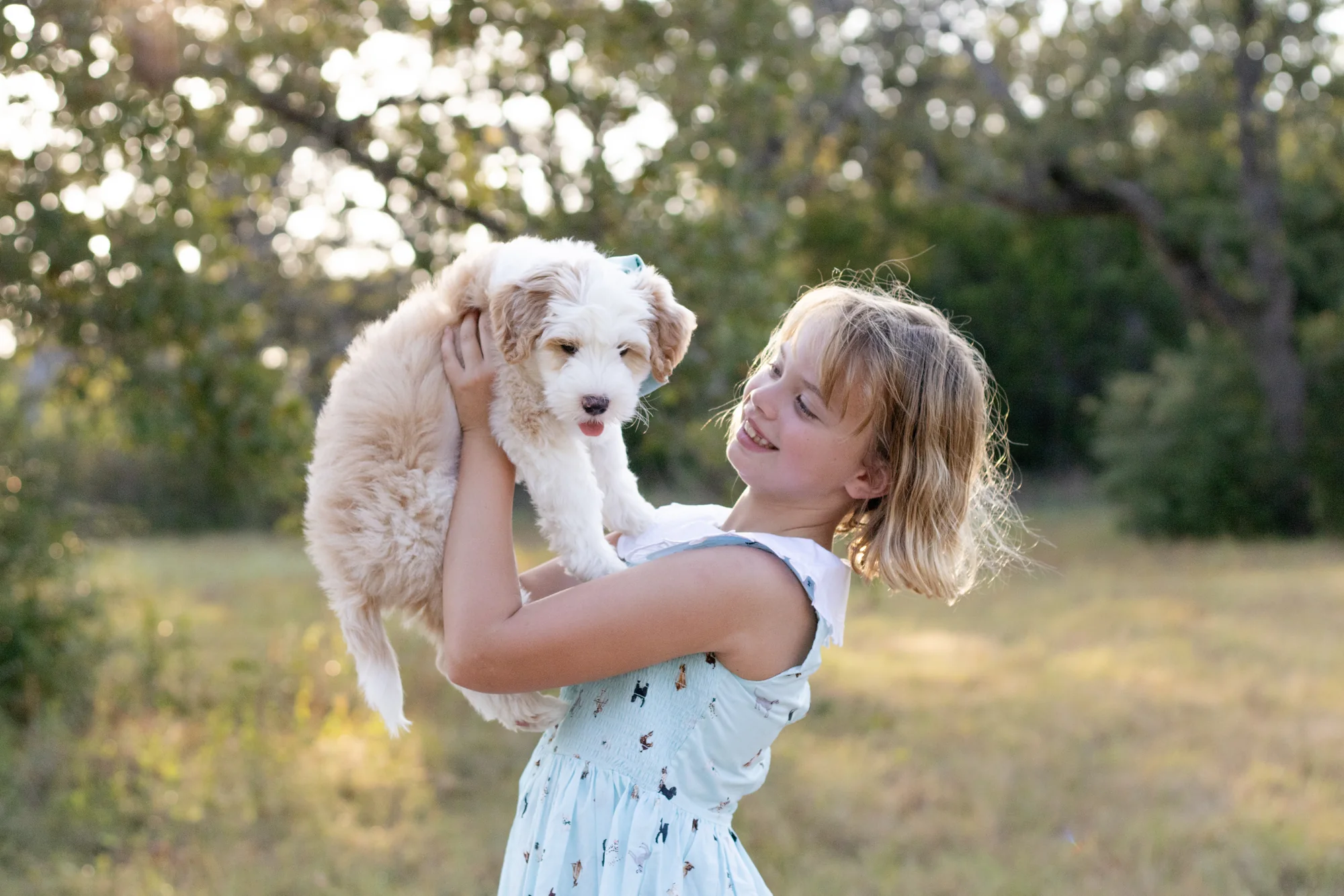 The Rosa children together with their new puppy